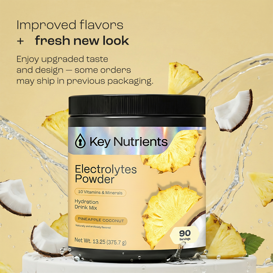 Electrolytes Powder tub with pineapple and coconut pieces, plus splash graphic