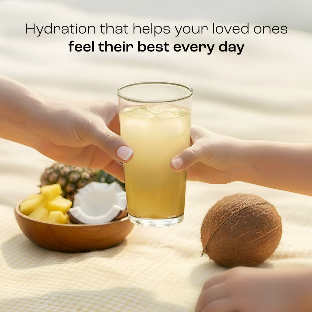 Electrolyte drink in a glass with coconut pieces on table, for everyday hydration