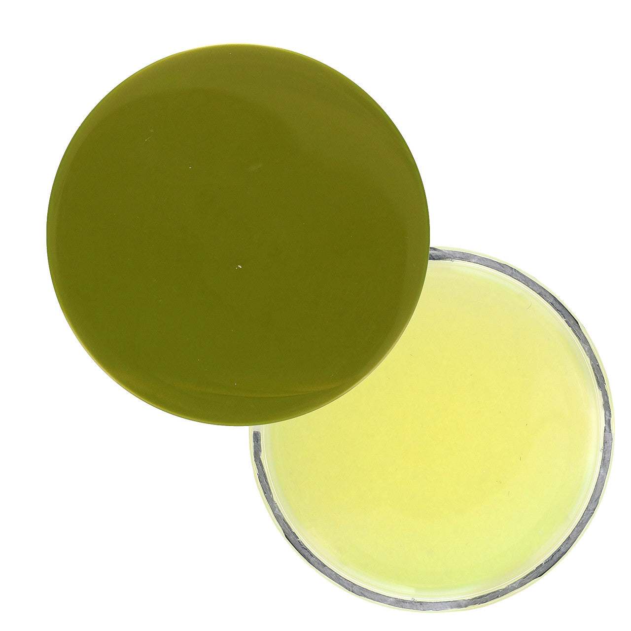 Open sea salt body scrub tub showing pale yellow-green cream