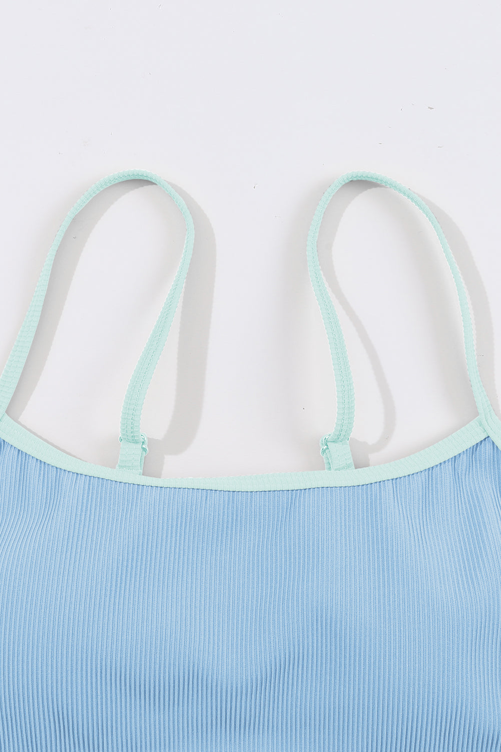 Beau Blue ribbed bikini top neckline with spaghetti straps and contrast trim
