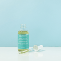 Laguna Herbals Soften body oil in glass bottle with clear nozzle