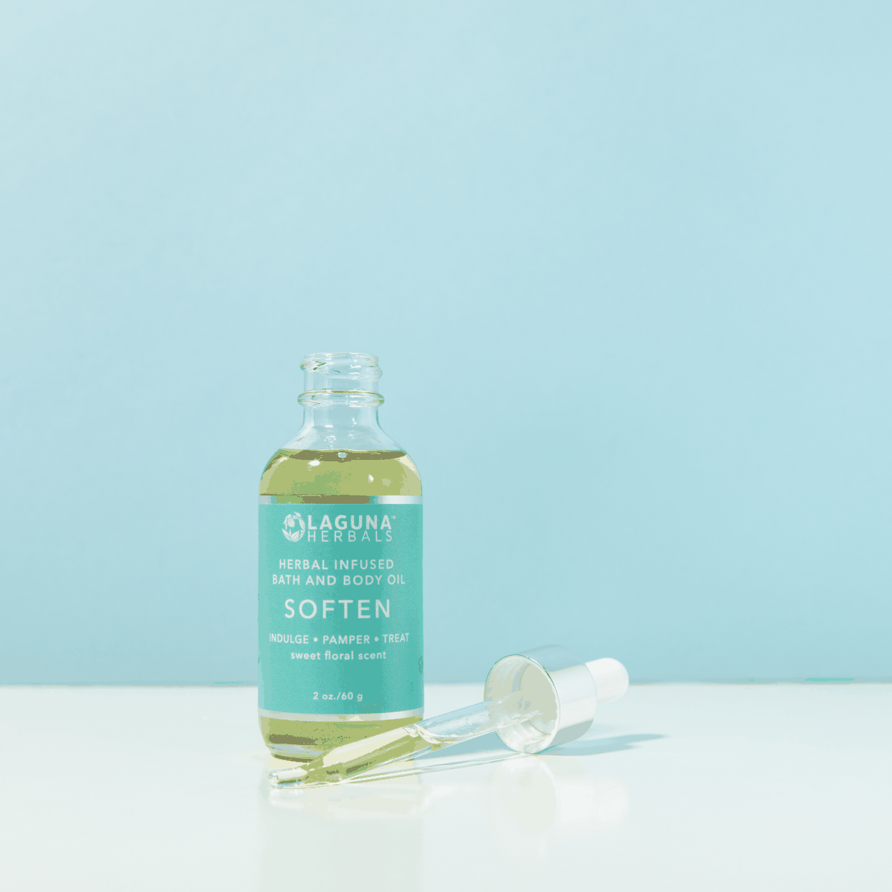 Laguna Herbals Soften body oil in glass bottle with clear nozzle
