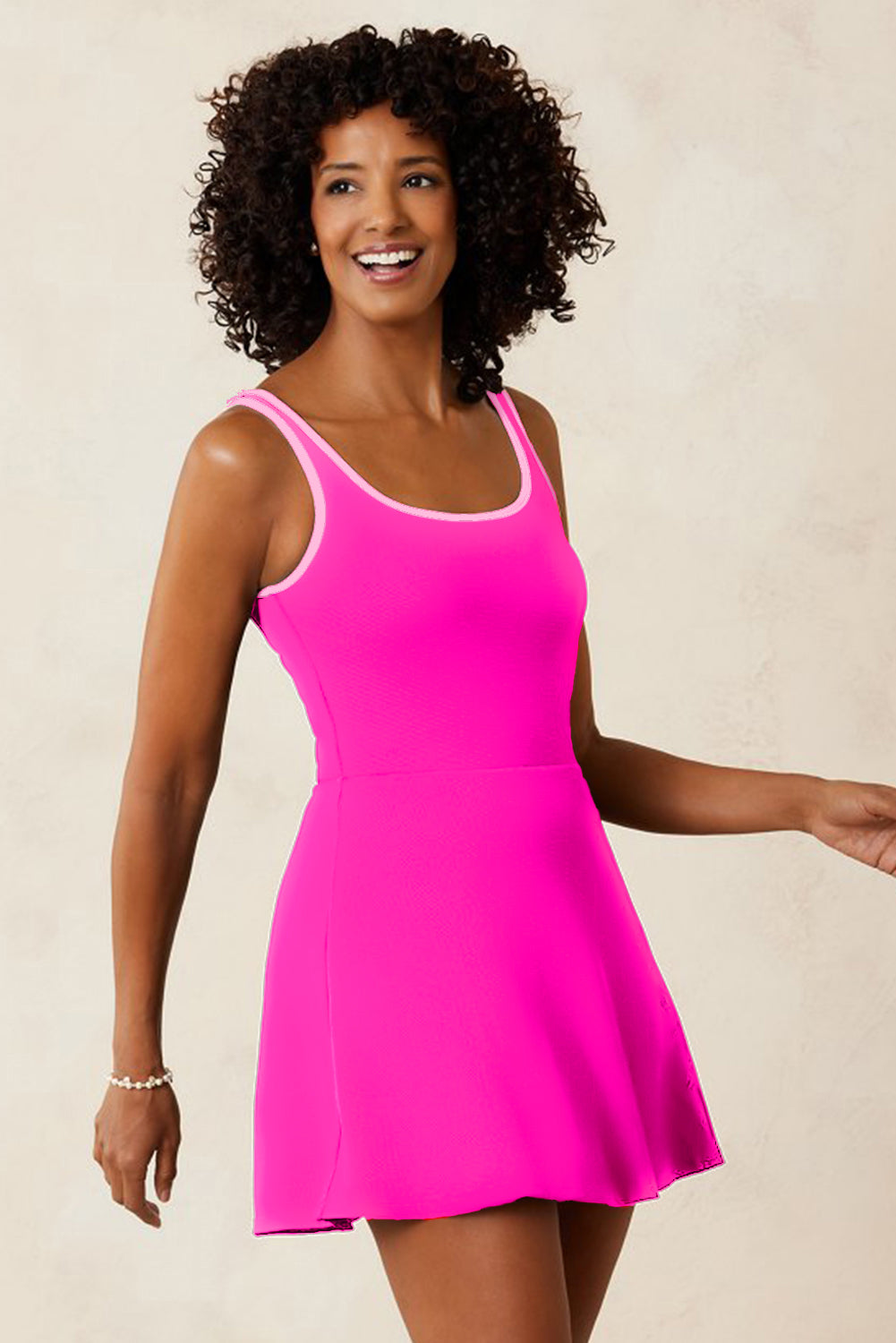Bright pink active swim dress with contrast neckline trim and flared skirt