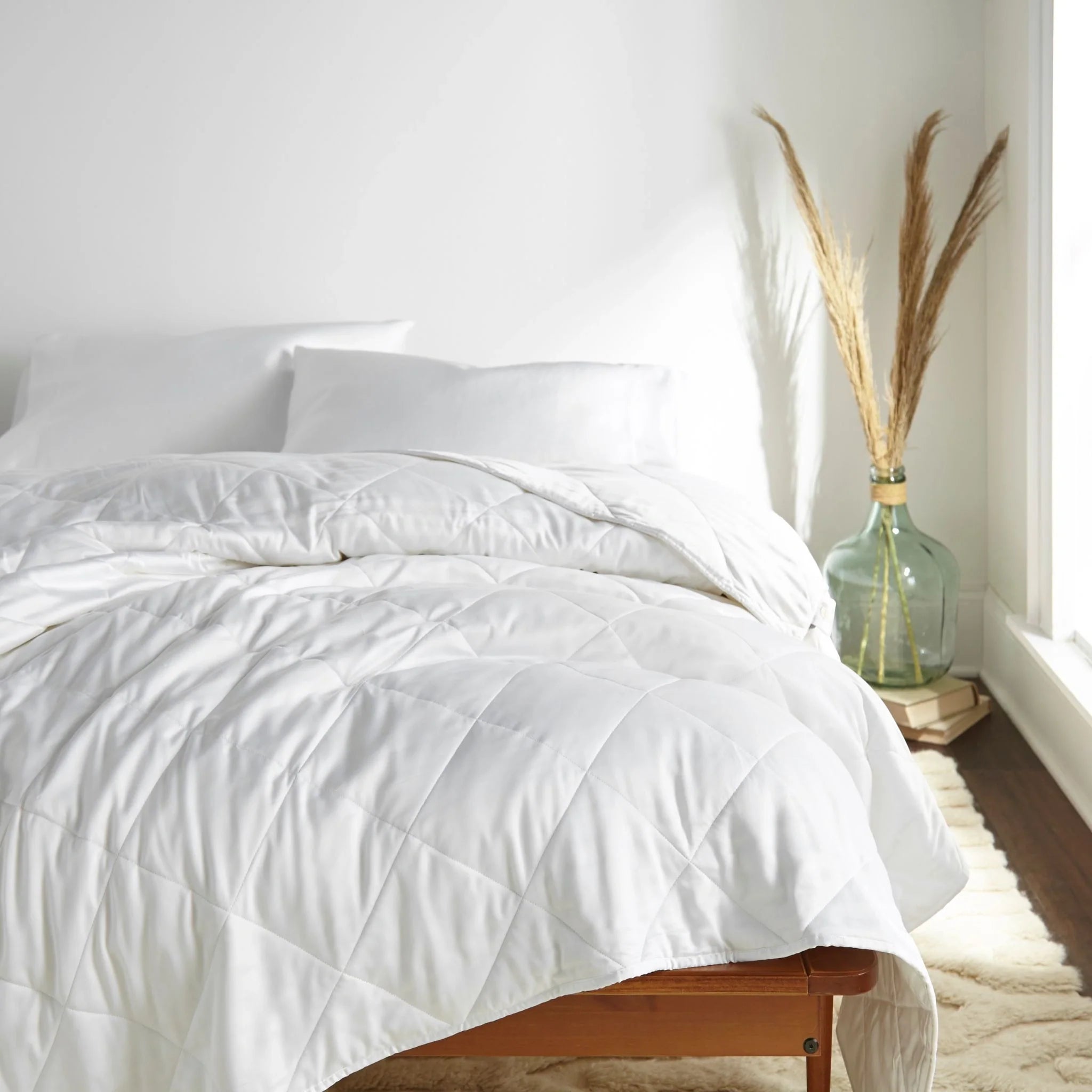 White duvet comforter with diamond-quilt stitching, soft box construction