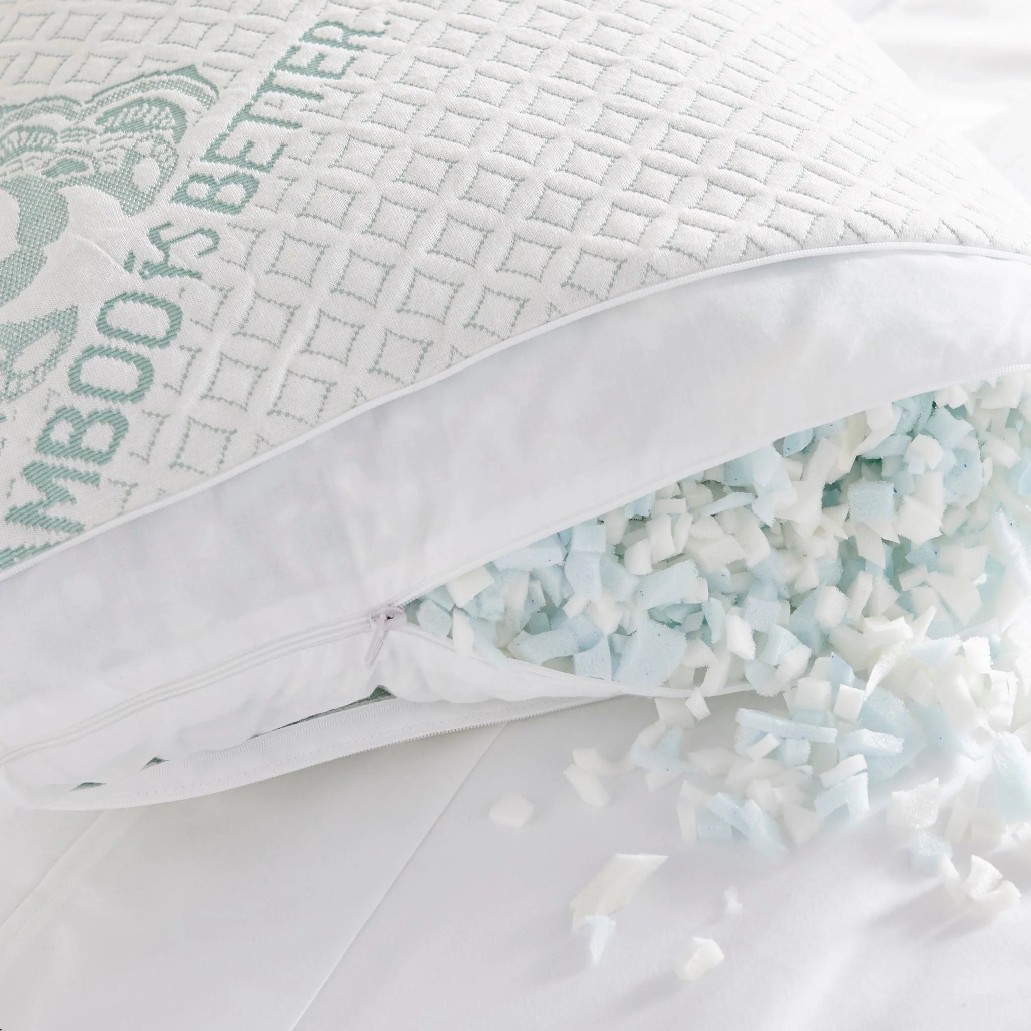 Adjustable bamboo cooling pillow showing zippered side and light blue foam filler