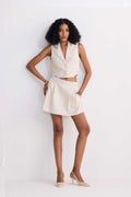 Cream cotton tweed skort with pleated front and structured waistband