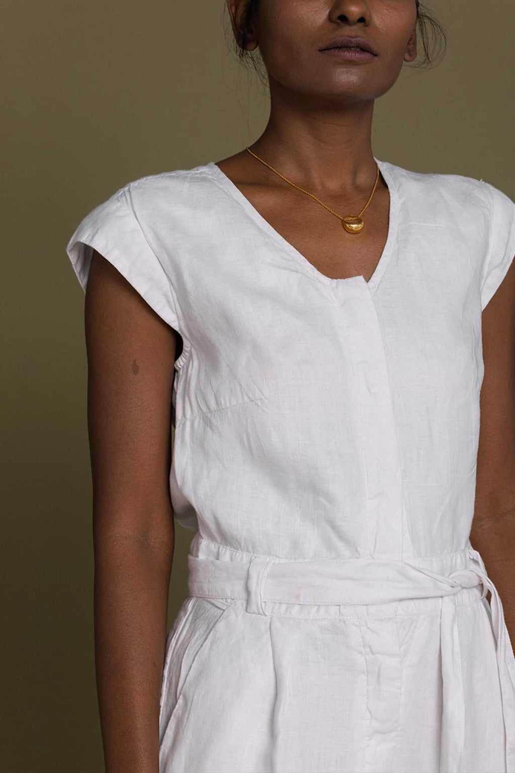 Evening Chai jumpsuit white; scoop V-neck, short sleeves, ruched tie-waist drawstring