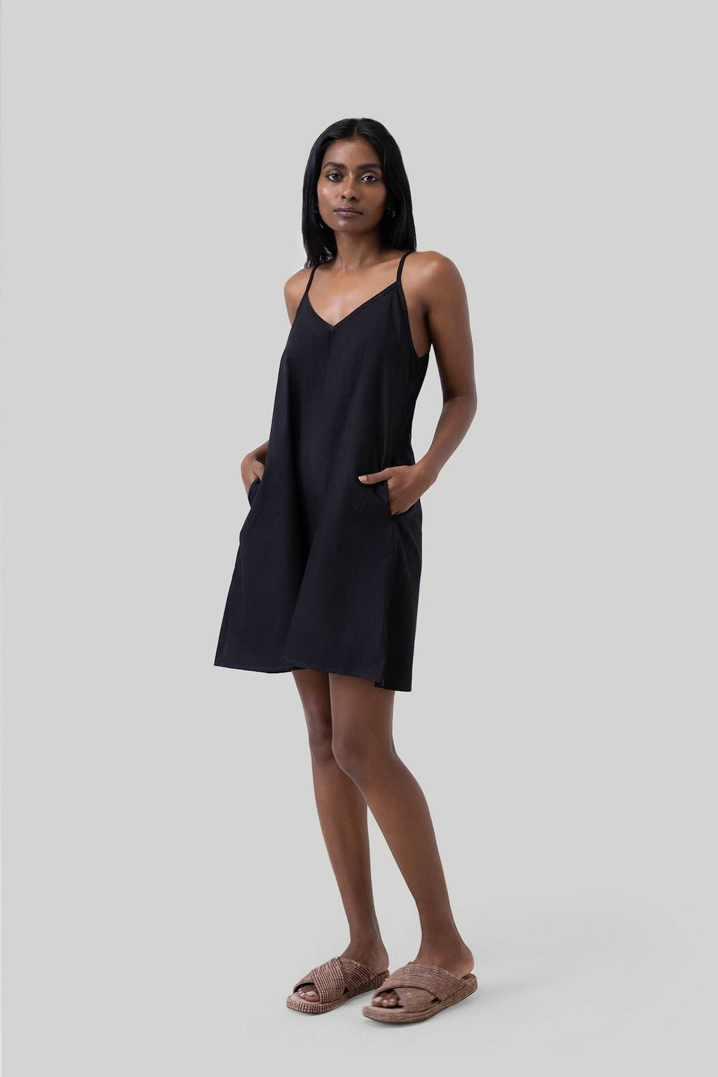 Black short tent dress with spaghetti straps and V-neck, loose A-line skirt