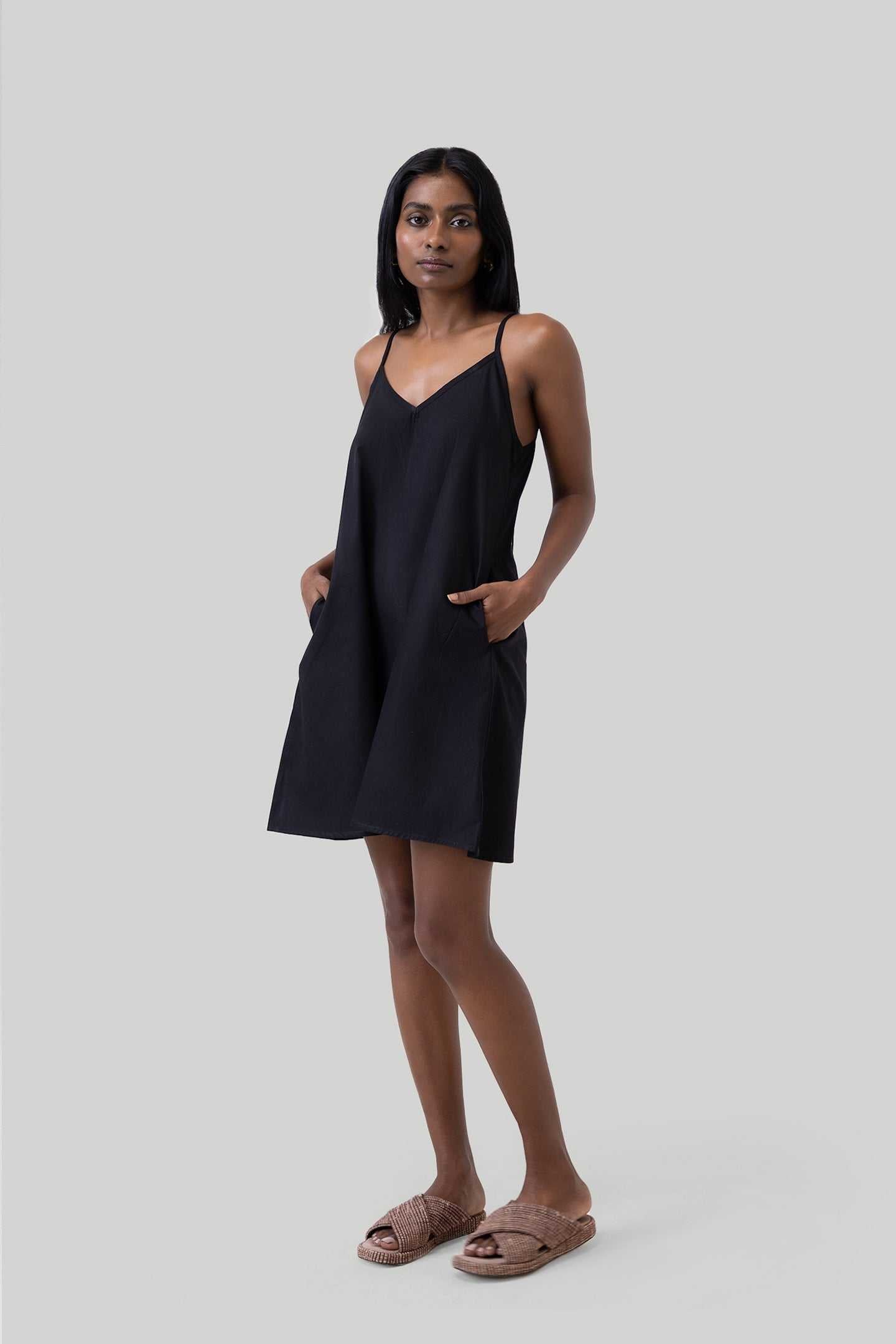 Black short tent dress with spaghetti straps and V-neck, loose A-line skirt