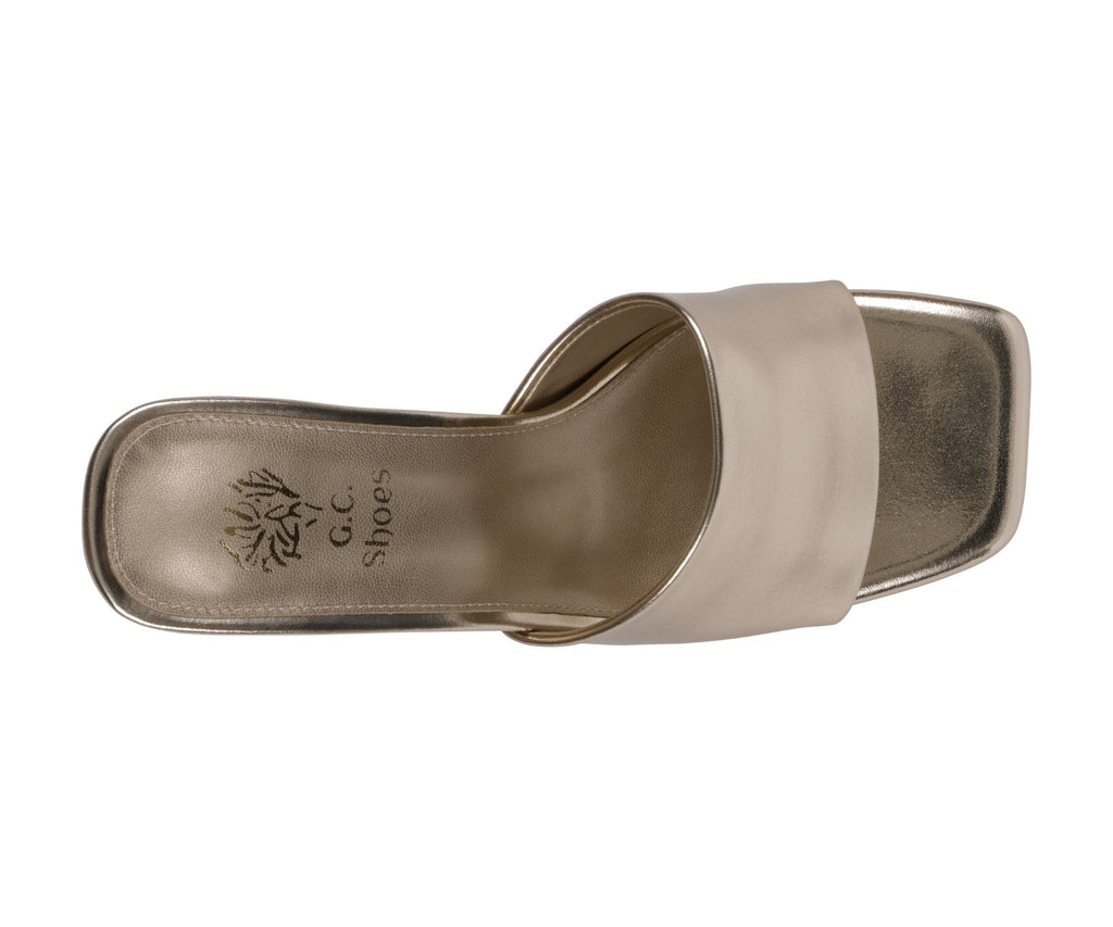 Gold heeled sandal with square toe strap and cushioned footbed (profile view)