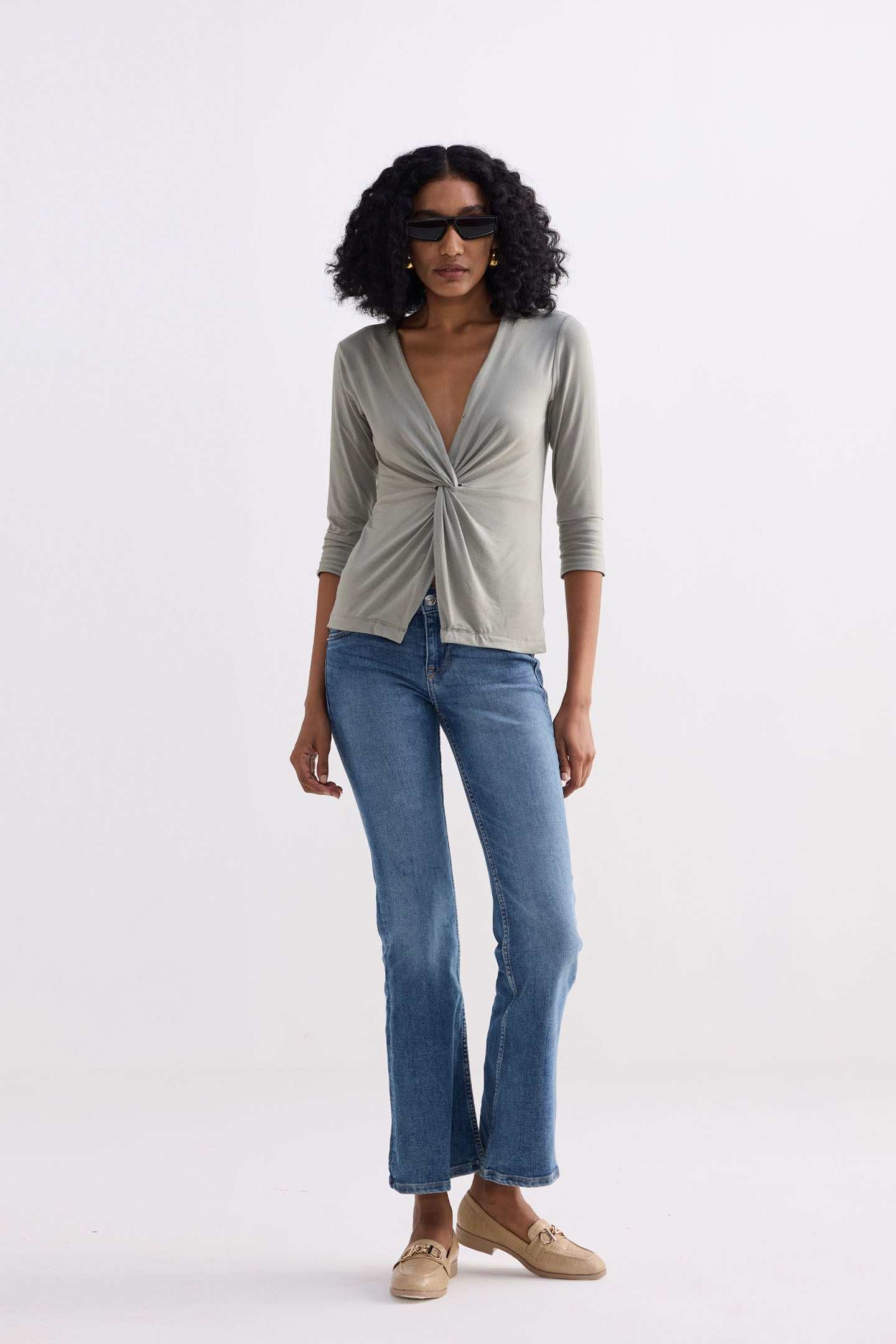 Light olive twist-front knit top, V-neck, knotted center seam