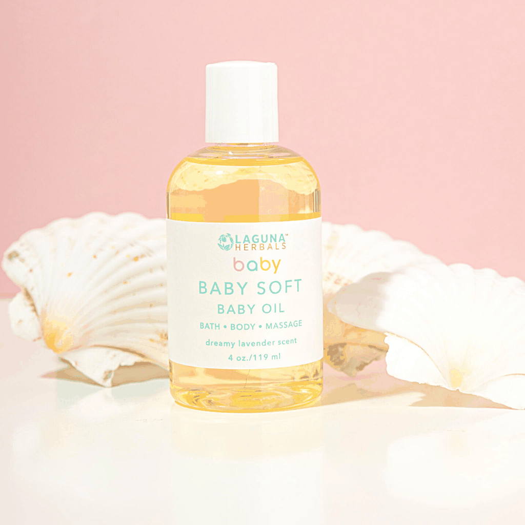 Organic Baby Soft baby oil bottle with white cap, amber liquid; bath, body & massage