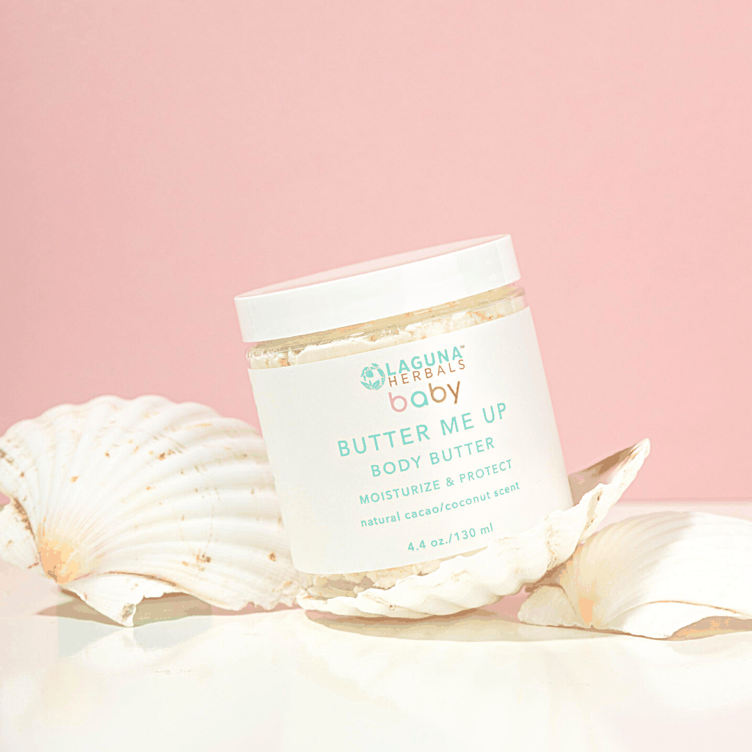 Butter Me Up body butter jar with shell-like scoop, natural cacao/coconut scent