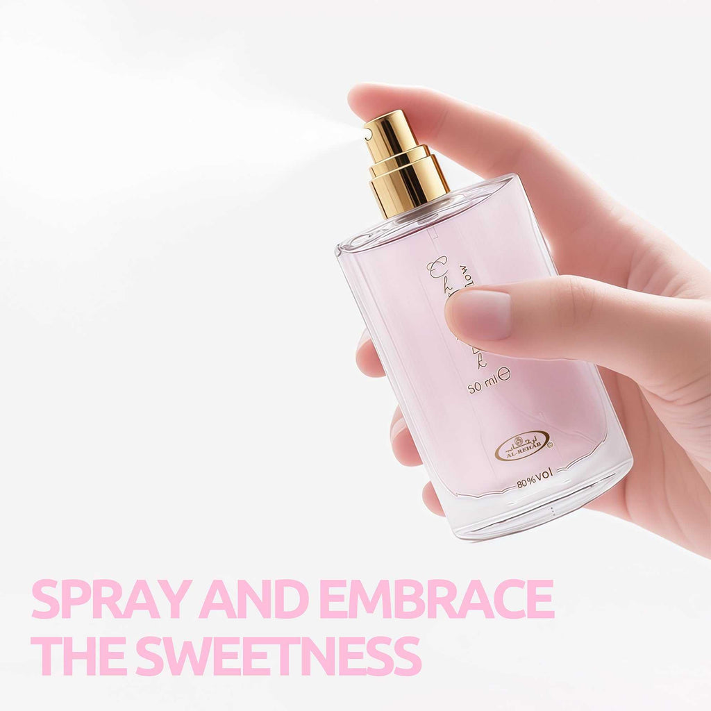 Choco Musk Marshmallow EDT held in hand, gold spray cap on pink 50 ml bottle