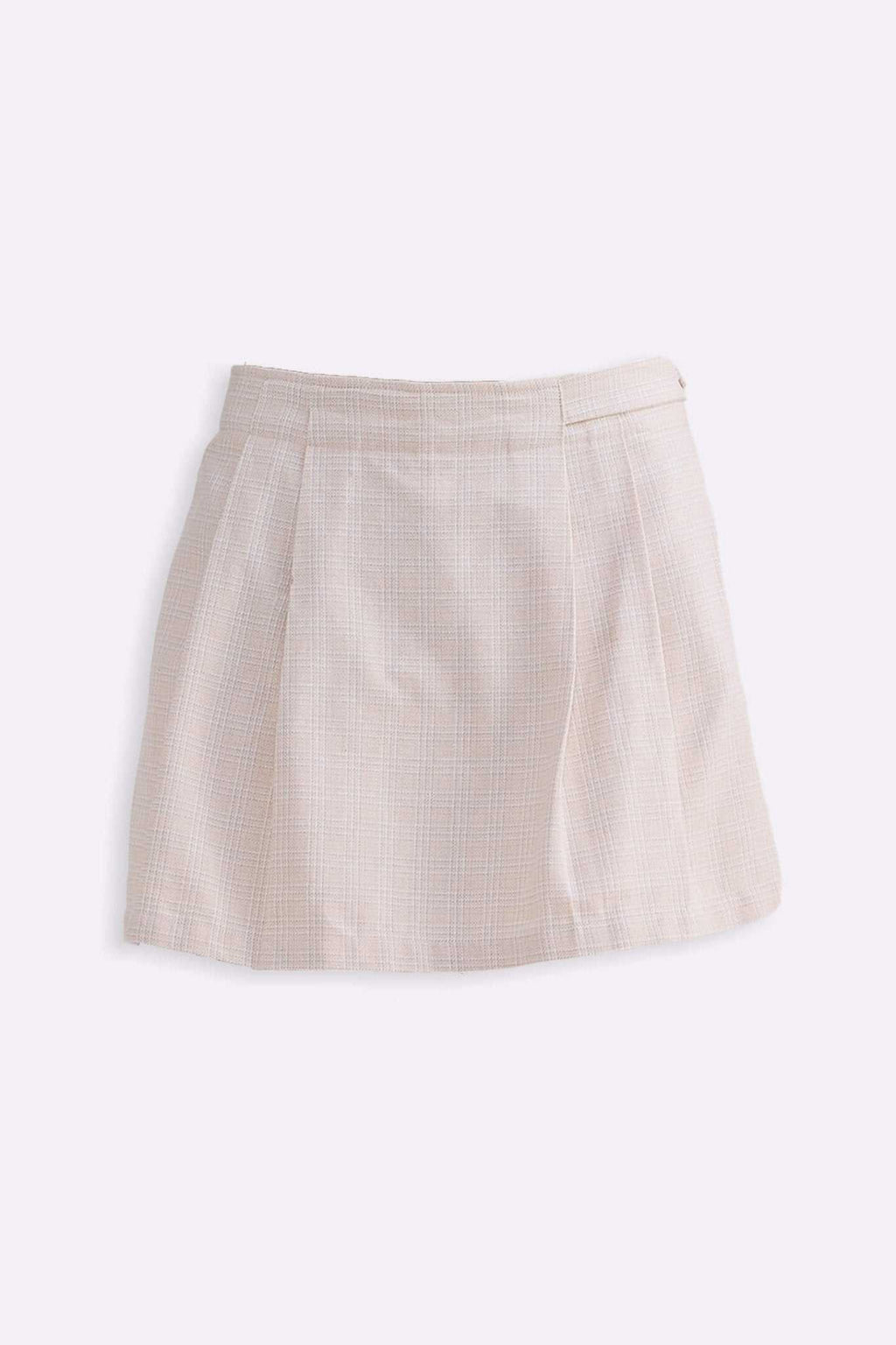 Cream cotton tweed skort laid flat, pleated skirt and elastic-free waistband