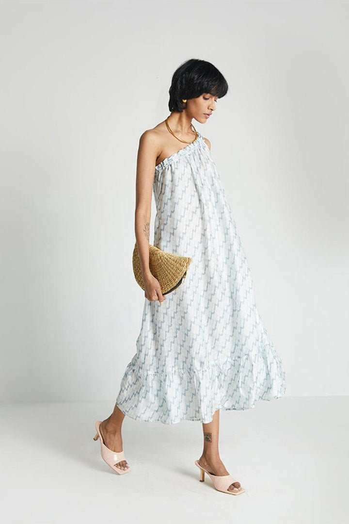 Moonlight Dress: front side view, one-shoulder gathered neckline, light blue zigzag midi
