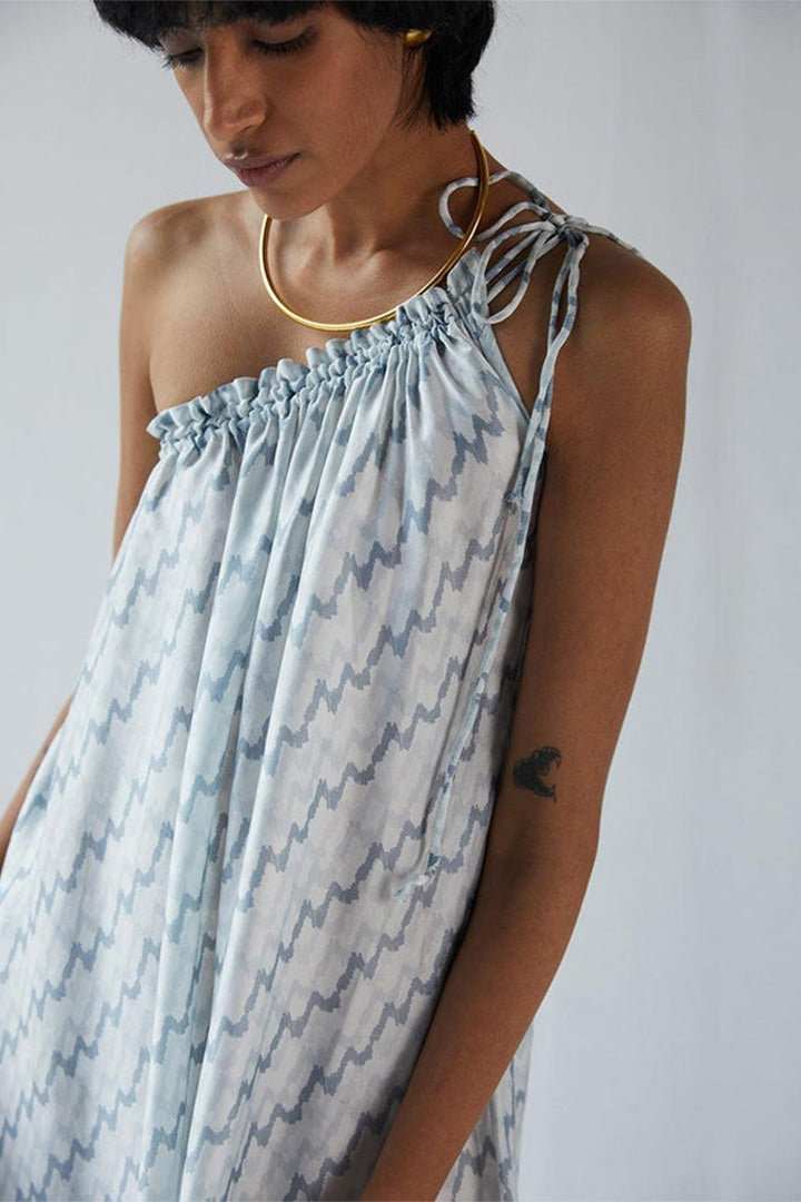 Moonlight Dress close-up: halter tie straps and gathered one-shoulder, light blue zigzag