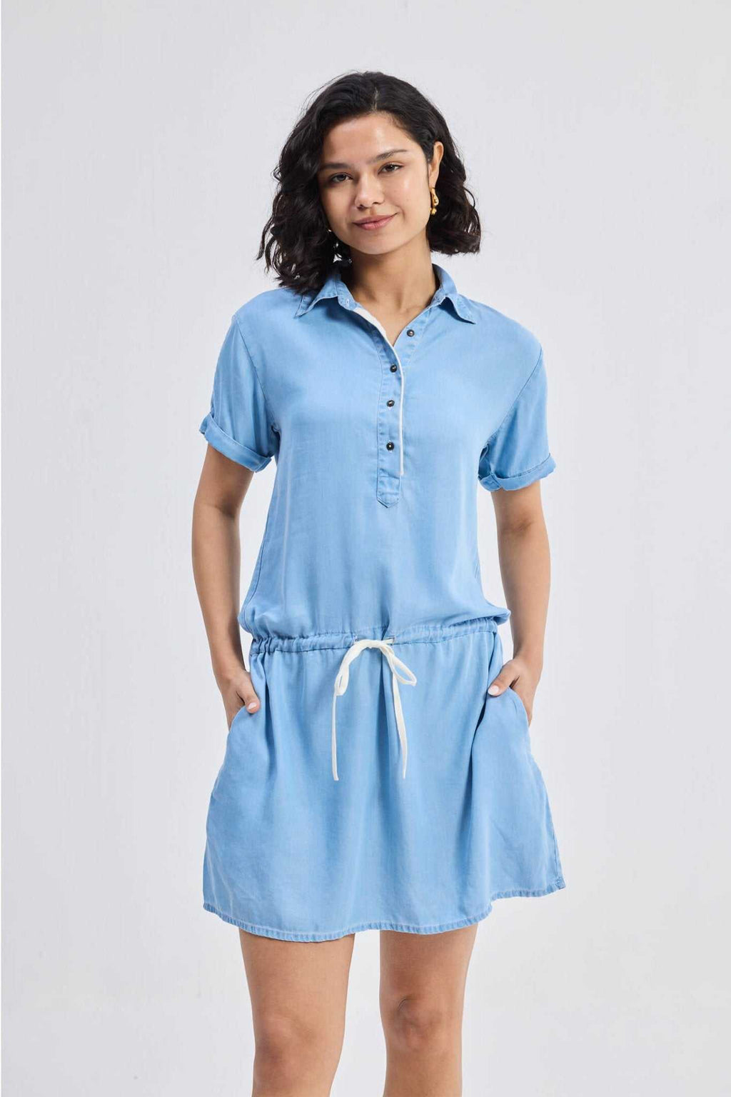Blue denim shirt dress with front buttons and adjustable drawstring waist