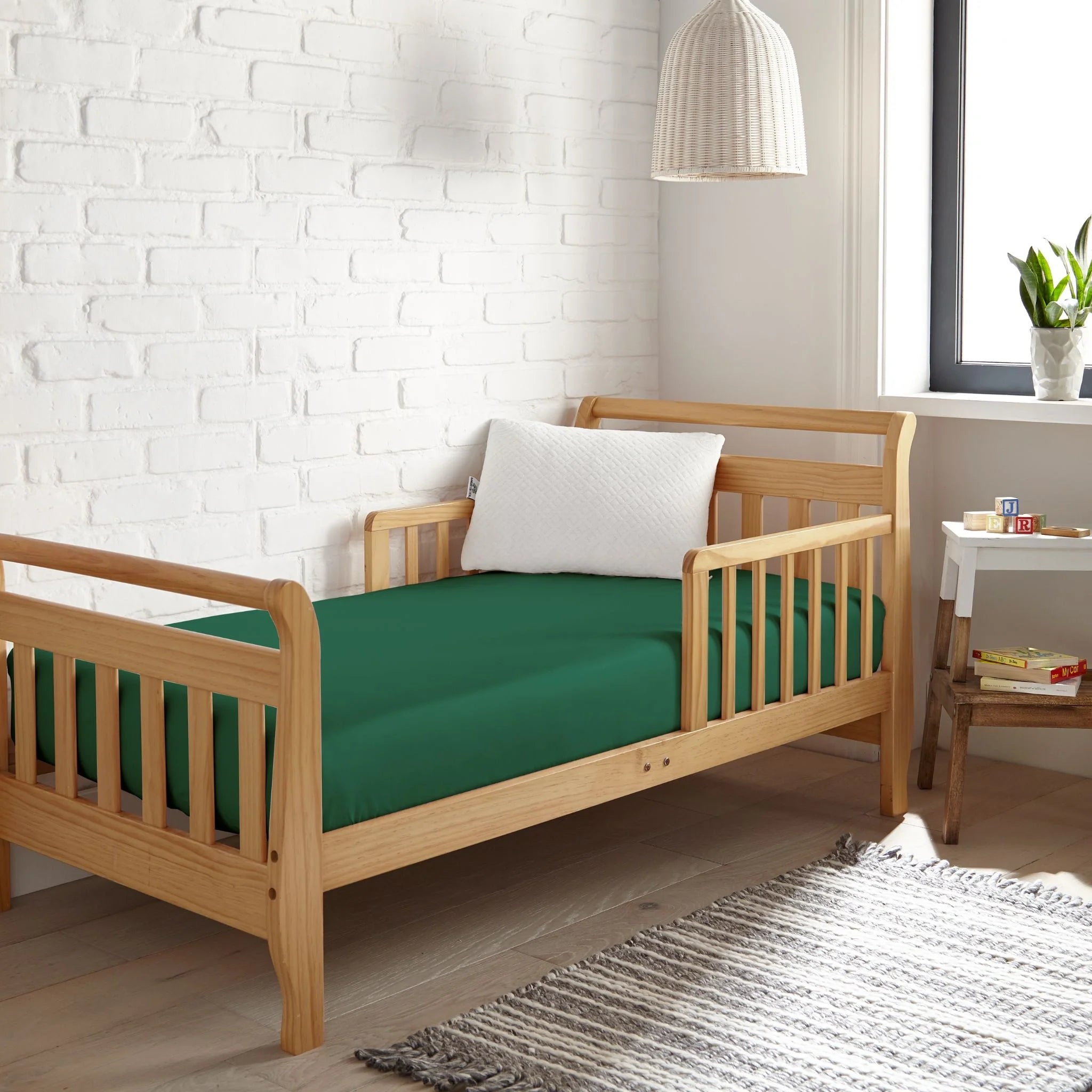 Cooling bamboo crib fitted sheet in deep emerald green, fitted bed sheet