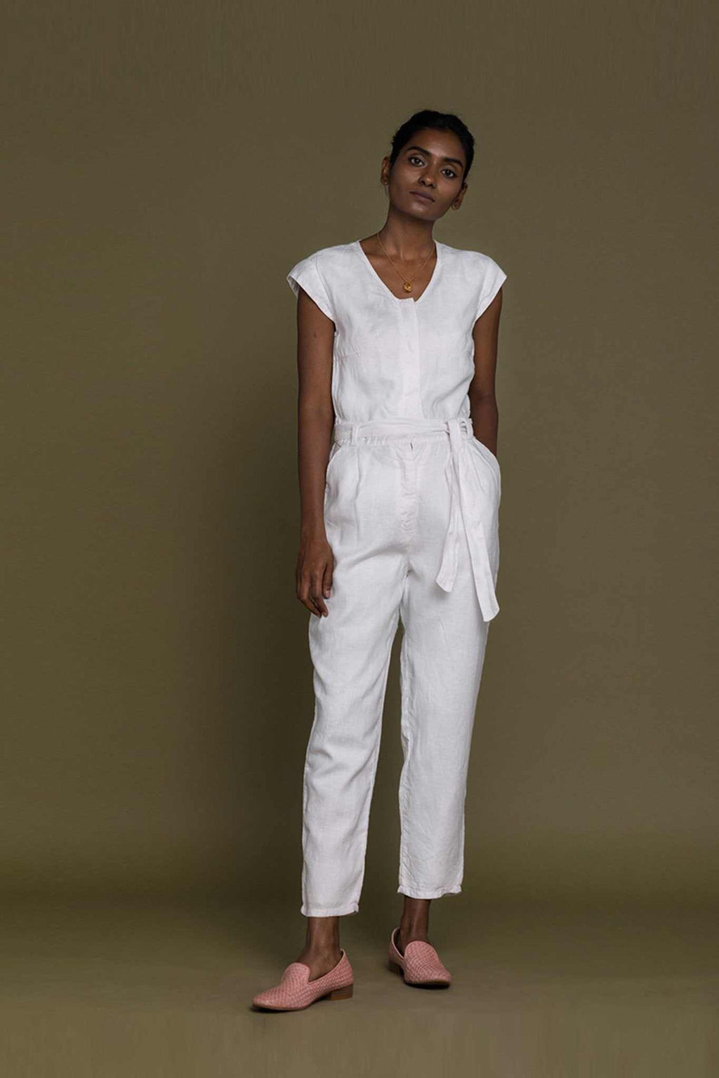 White Evening Chai jumpsuit full front view with V-neck and relaxed tapered legs