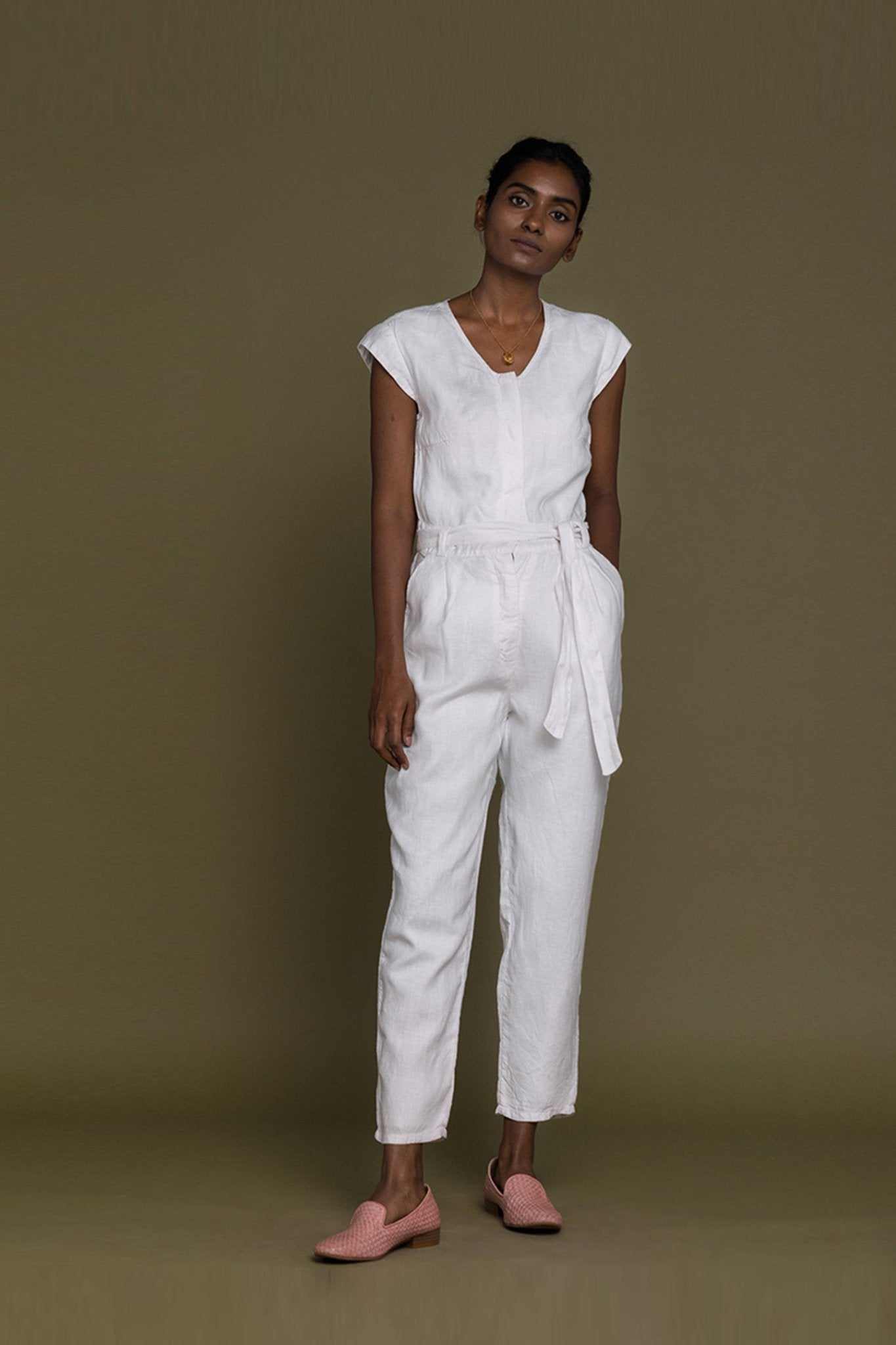 White Evening Chai jumpsuit full front view with V-neck and relaxed tapered legs