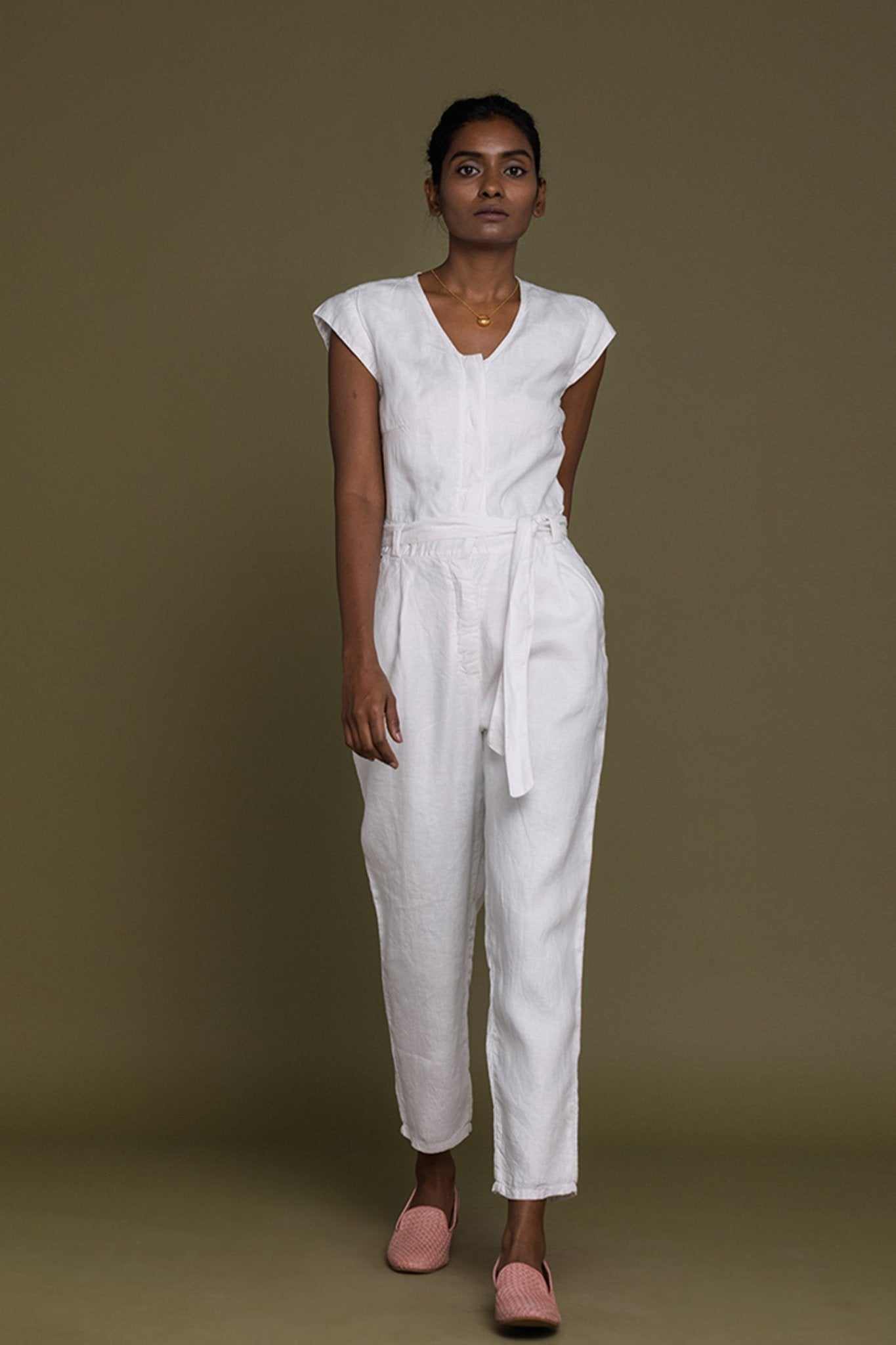White Evening Chai jumpsuit with V-neck, short sleeves, and belted waist