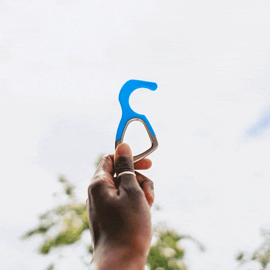Blue silicone no-touch keychain tool with finger loop and metal key ring