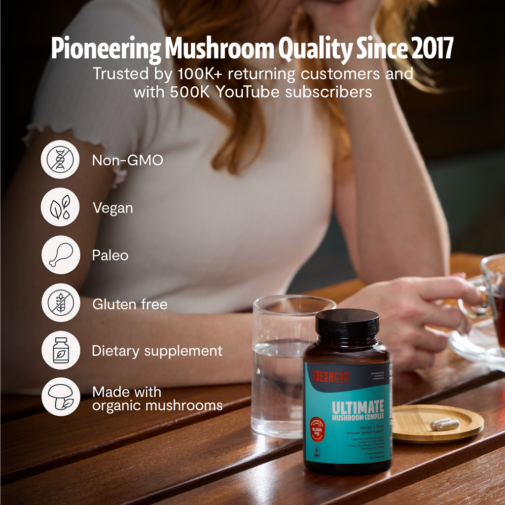 Ultimate Mushroom Complex bottle on table with drinking glass and nutrition badges