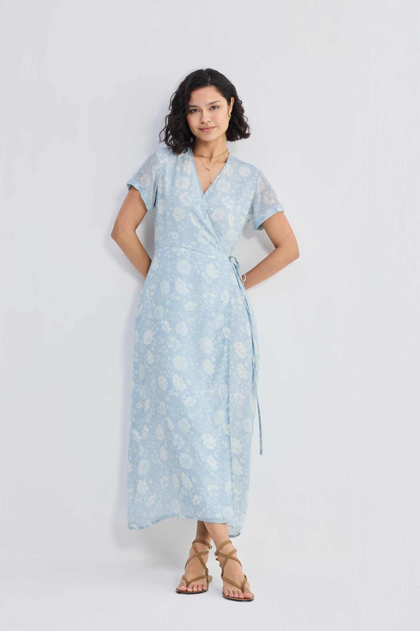 Maxi wrap dress in light-blue floral print with V-neck and tied waist sash