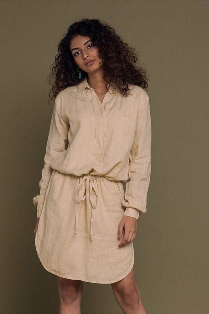 Meet Me by the Cliff Dress front view: neutral beige shirt dress with waist tie