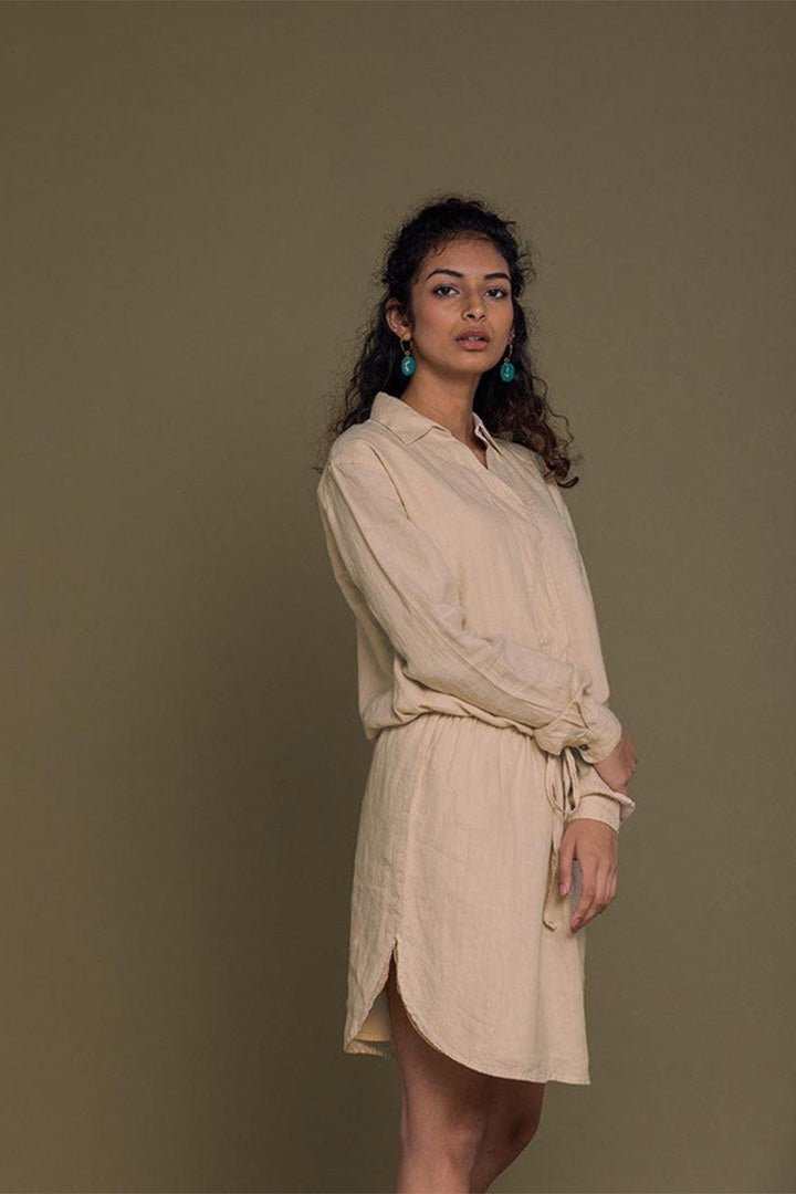 Meet Me by the Cliff Dress 3/4 view: neutral beige mini with collar and button front