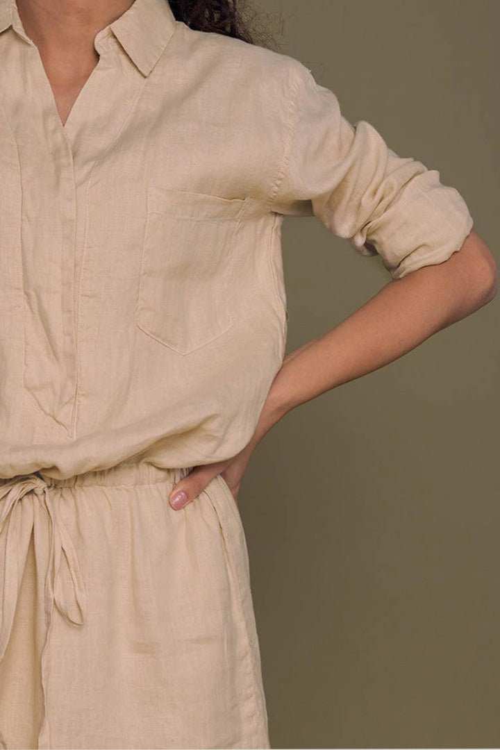 Meet Me by the Cliff Dress close-up: neutral beige sleeves and gathered waist tie