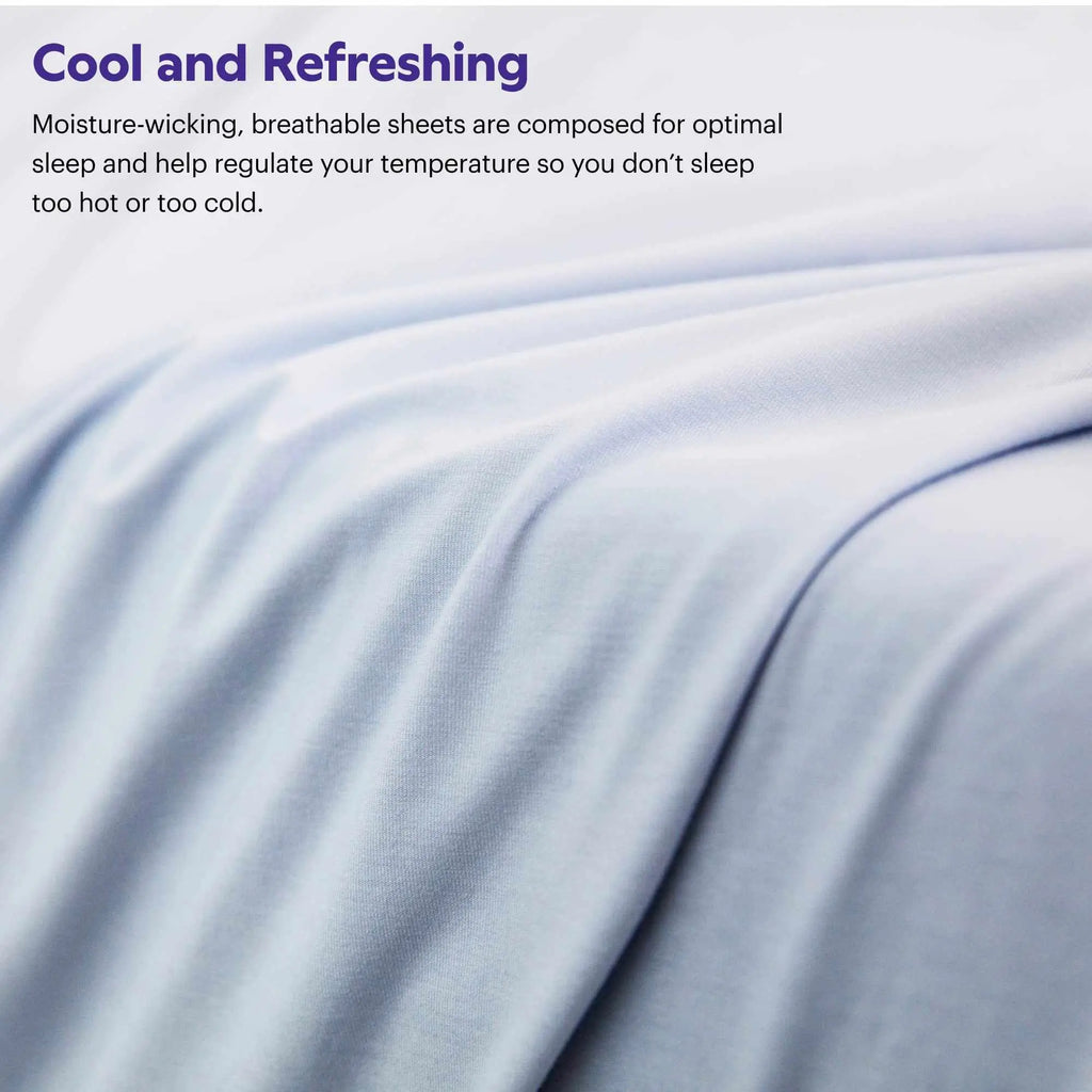 Close-up of SoftStretch moisture-wicking fabric, light blue-grey sheet surface