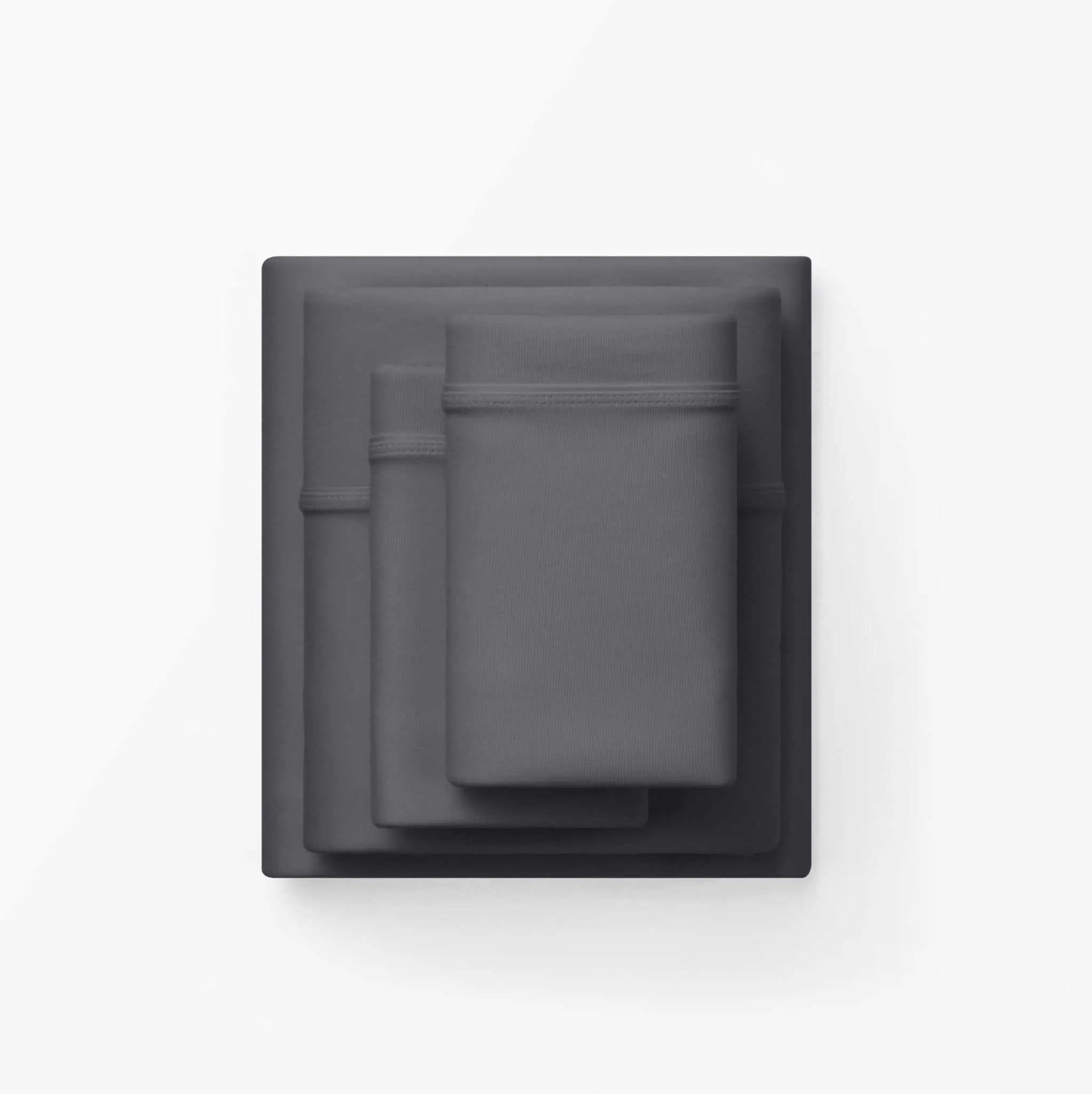 Stormy Grey sheets set with fitted sheet corner seams, folded for display