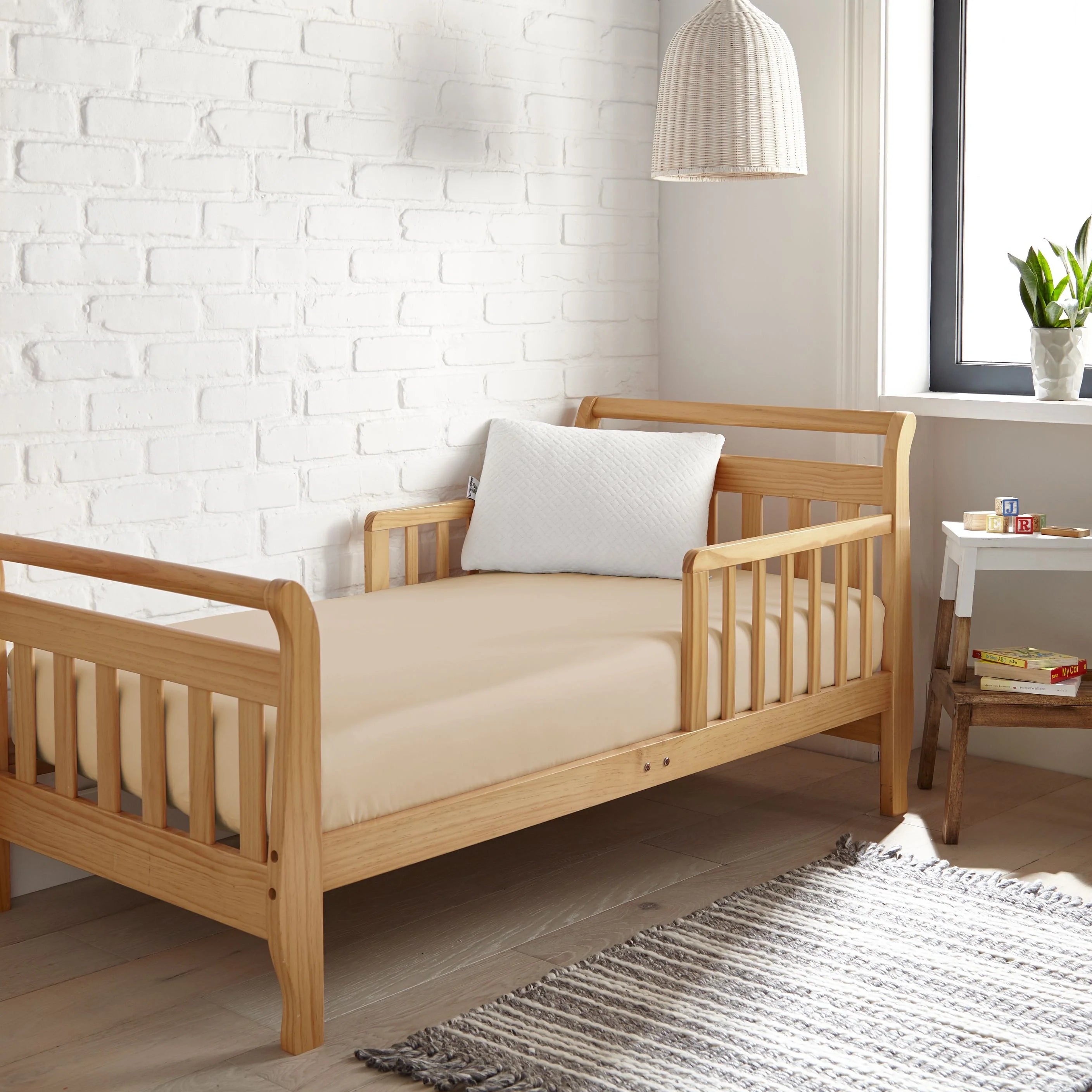 Ivory-white cooling bamboo crib fitted sheet, snug coverage on crib mattress
