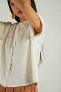 The Daydreams Shirt in shell off-white: short-sleeve button-front blouse, sleeve ties