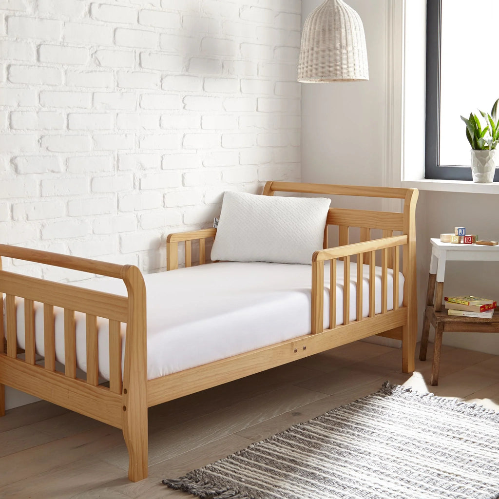 White crib fitted sheet with quilted texture; fitted cover for crib mattress
